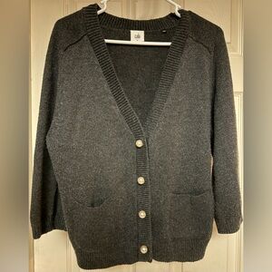 Women’s medium gray cardigan sweater. Front pockets. 3 snap closures.